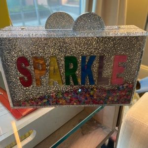 “Sparkle” acrylic clutch with confetti design by Bari Lynn.